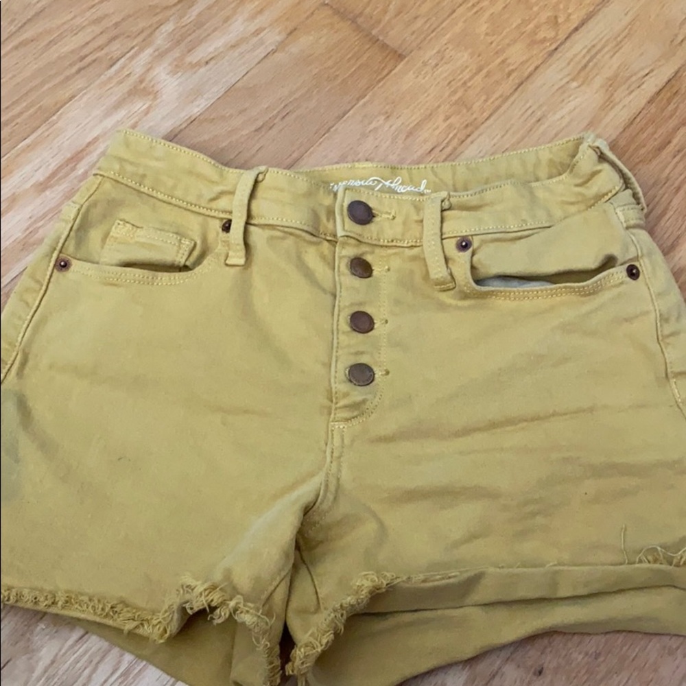yellow mid thigh shorts